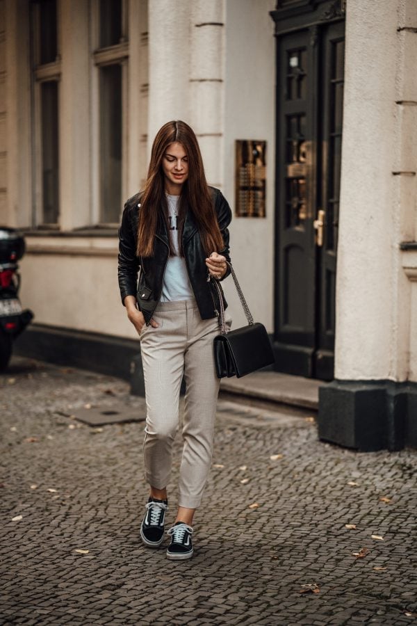 Black Leather Moto Jacket with Graphic Tee and Straight Leg Trousers Black Leather Moto Jacket with Graphic Tee and Straight Leg Trousers — Trendy Jacket Outfits