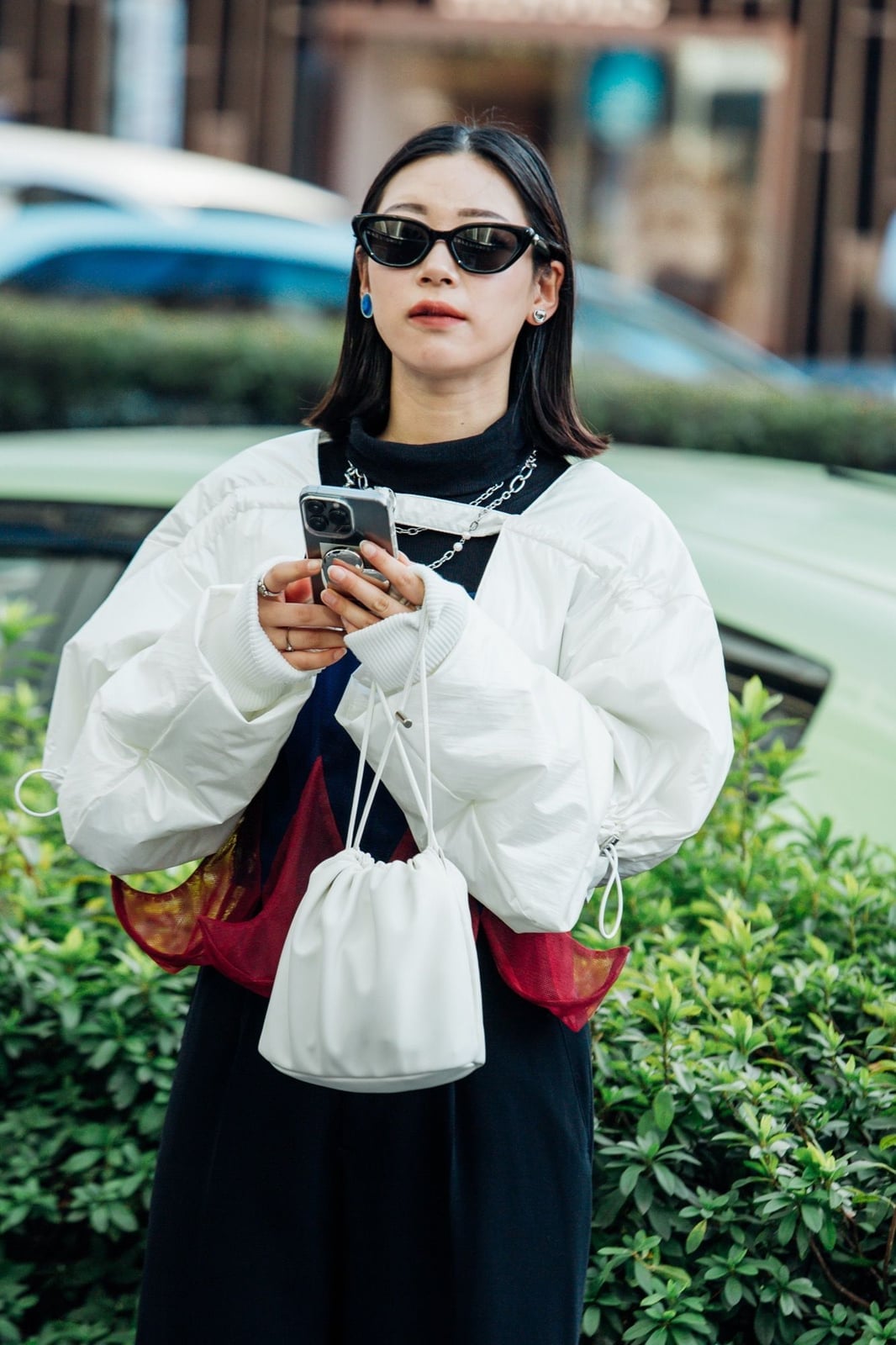 White Puffer Jacket Over Black Turtleneck and Colorful Layers White Puffer Jacket Over Black Turtleneck and Colorful Layers — Trendy Japan Outfits