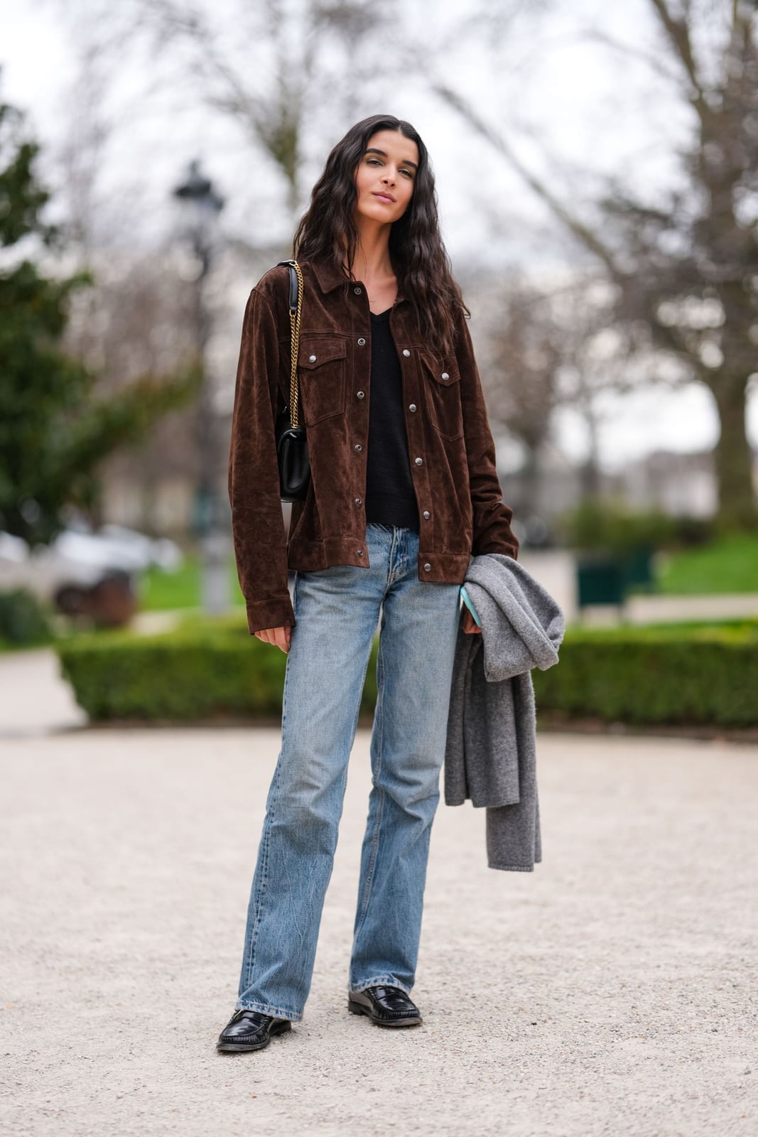 Light Wash Straight-Leg Jeans with a Black T-Shirt and Suede Jacket — Trendy Jeans Outfits