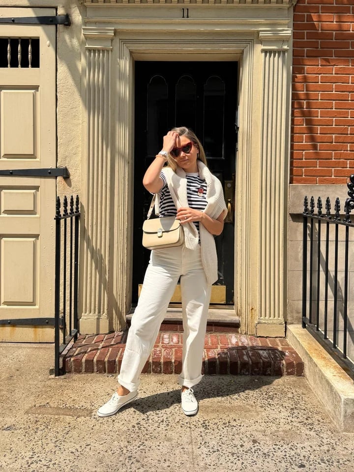 White High-Waisted Straight-Leg Jeans with a Sweater Vest — Trendy Jeans Outfits