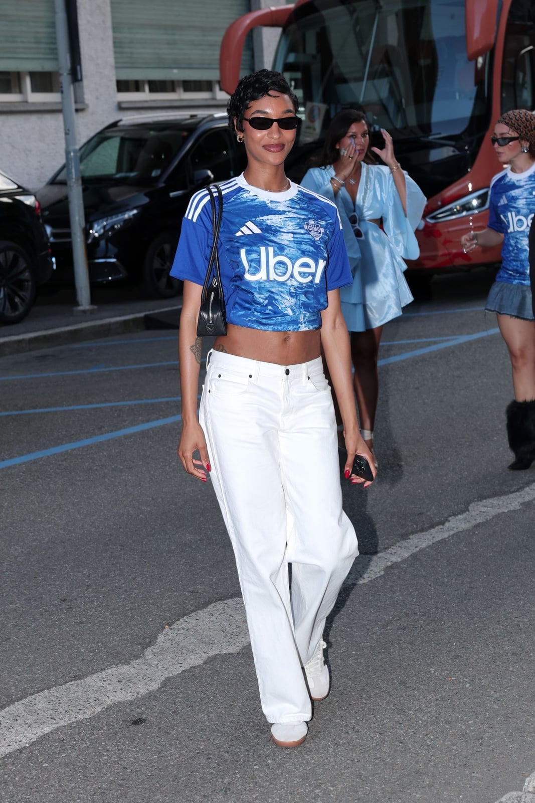 White Wide-Leg Jeans with a Cropped Blue Jersey Top — Trendy Jeans Outfits