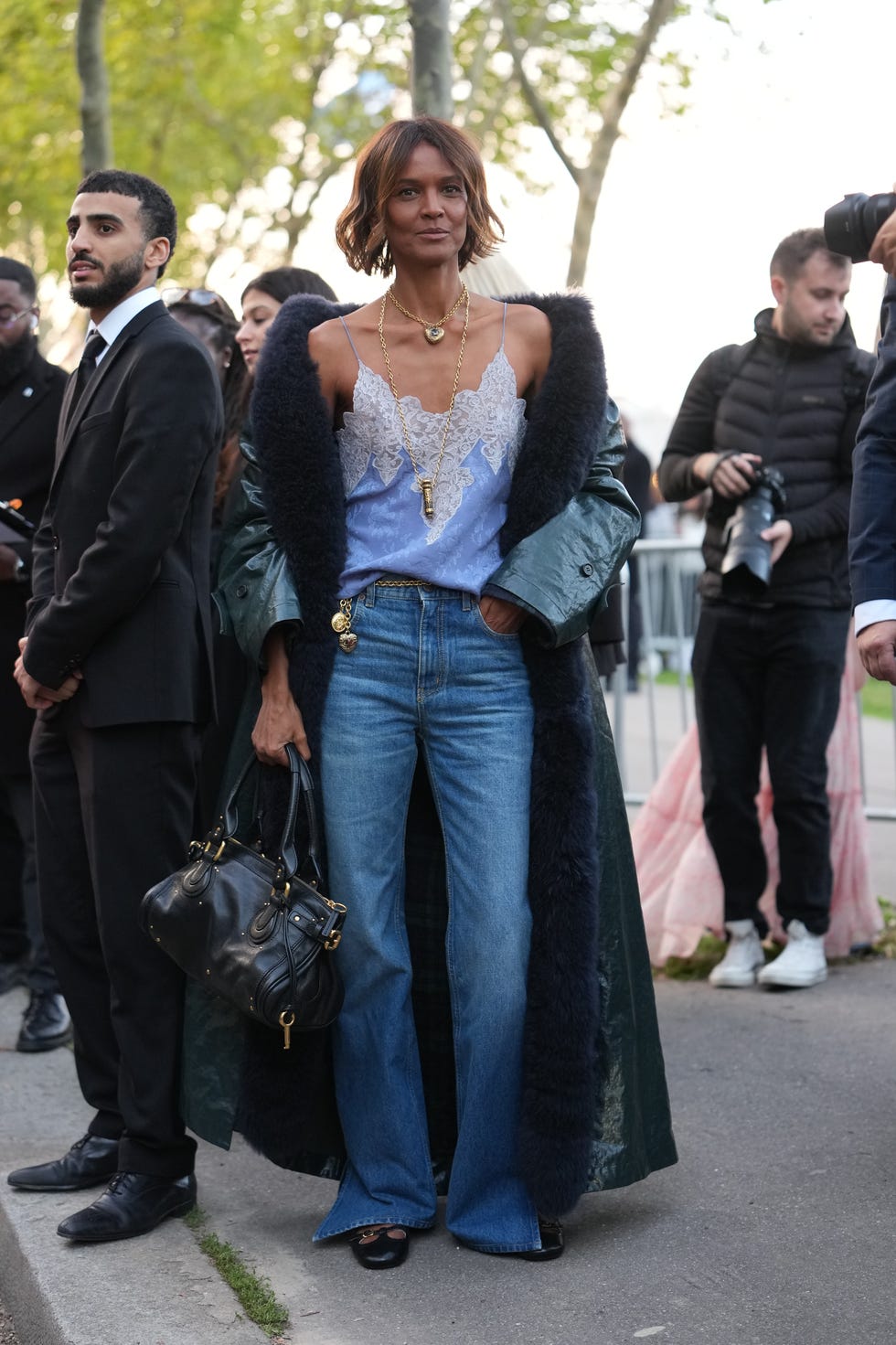 Blue Straight-Leg Jeans with a Lace Camisole and Fur-Trimmed Coat — Trendy Jeans Outfits
