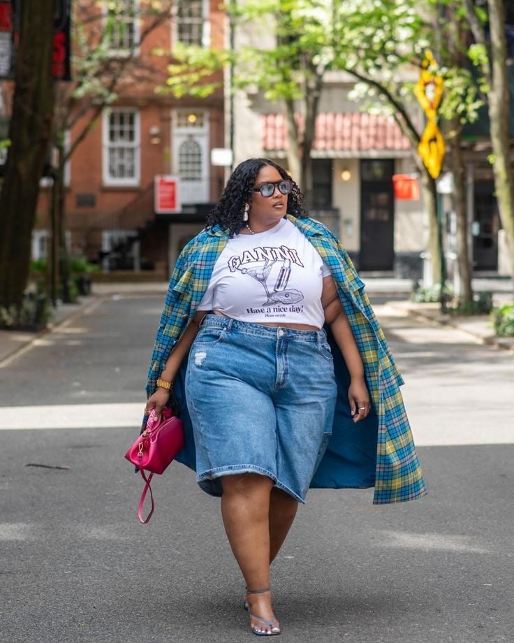 Medium Wash Jorts With Graphic Crop Top And Plaid Shirt Jacket — Trendy Jorts Outfits