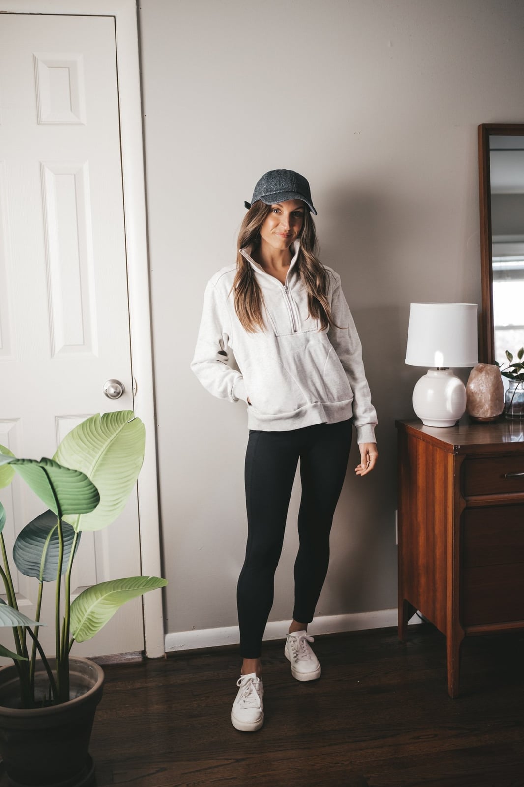 Quarter-Zip Sweatshirt with Black Leggings and Denim Cap Quarter-Zip Sweatshirt with Black Leggings and Denim Cap — Trendy Leggings Outfits