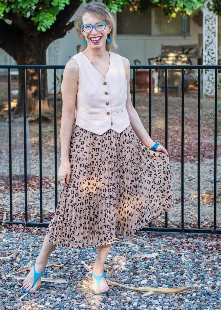 Pleated Leopard Midi Skirt With Pink Vest — Trendy Leopard Skirt Outfit