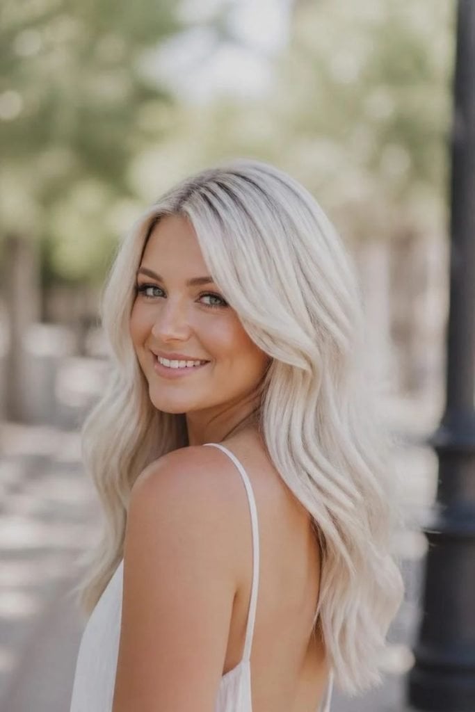 Thick Wavy Icy Blonde With Highlights — Trendy Light Hair Color