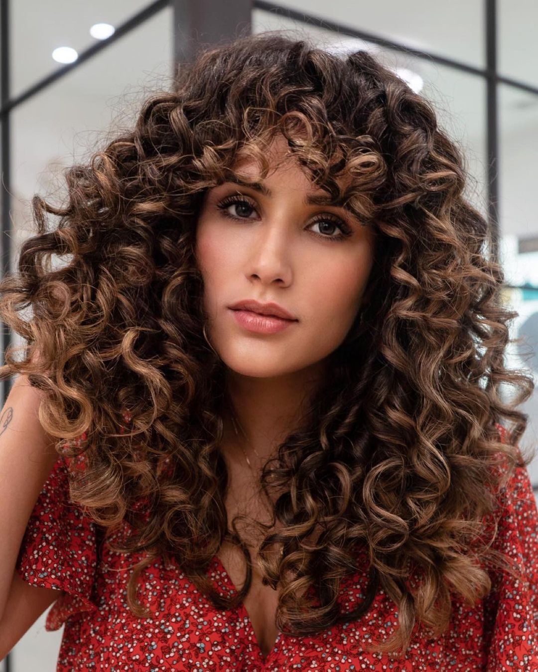 Collarbone Layers With Full Curtain Bangs Collarbone Layers With Full Curtain Bangs — Trendy Long Curly Hair