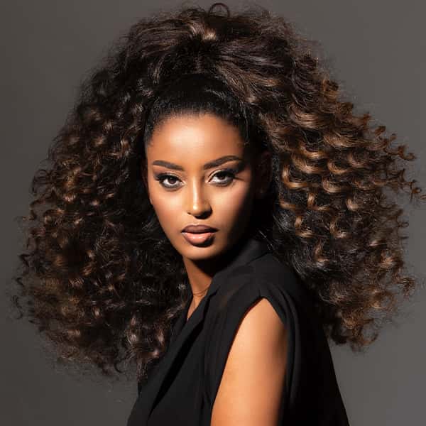 Mid-Back Voluminous Curly Ponytail Mid-Back Voluminous Curly Ponytail — Trendy Long Curly Hair