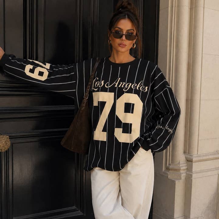 Striped Sweatshirt with Cream Wide-Leg Trousers Striped Sweatshirt with Cream Wide-Leg Trousers — Trendy Los Angeles Outfits