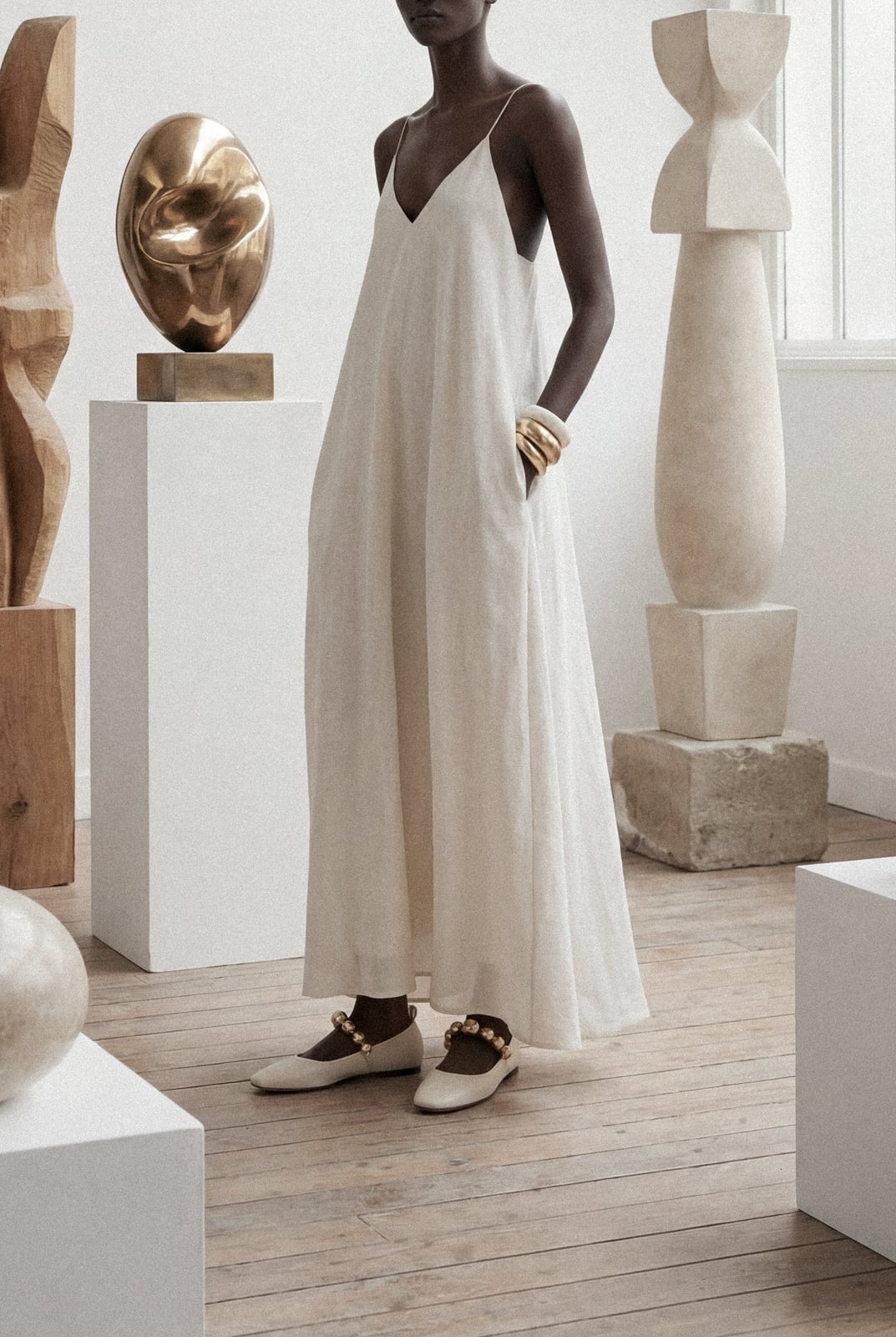 Off-White Sleeveless Maxi Dress for Resort Wear Trendy Luxury Outfits