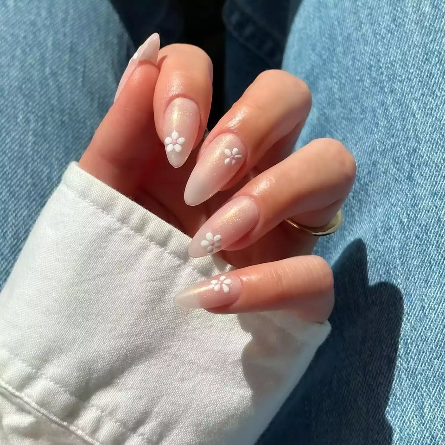 Shimmering Nude Long Sharp Almond Nails with White Flowers — Trendy Manicure Nails