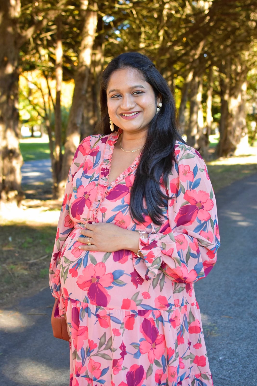 Pink Floral Chiffon Dress with Ruffles, Close-Up Take — Trendy Maternity Outfits