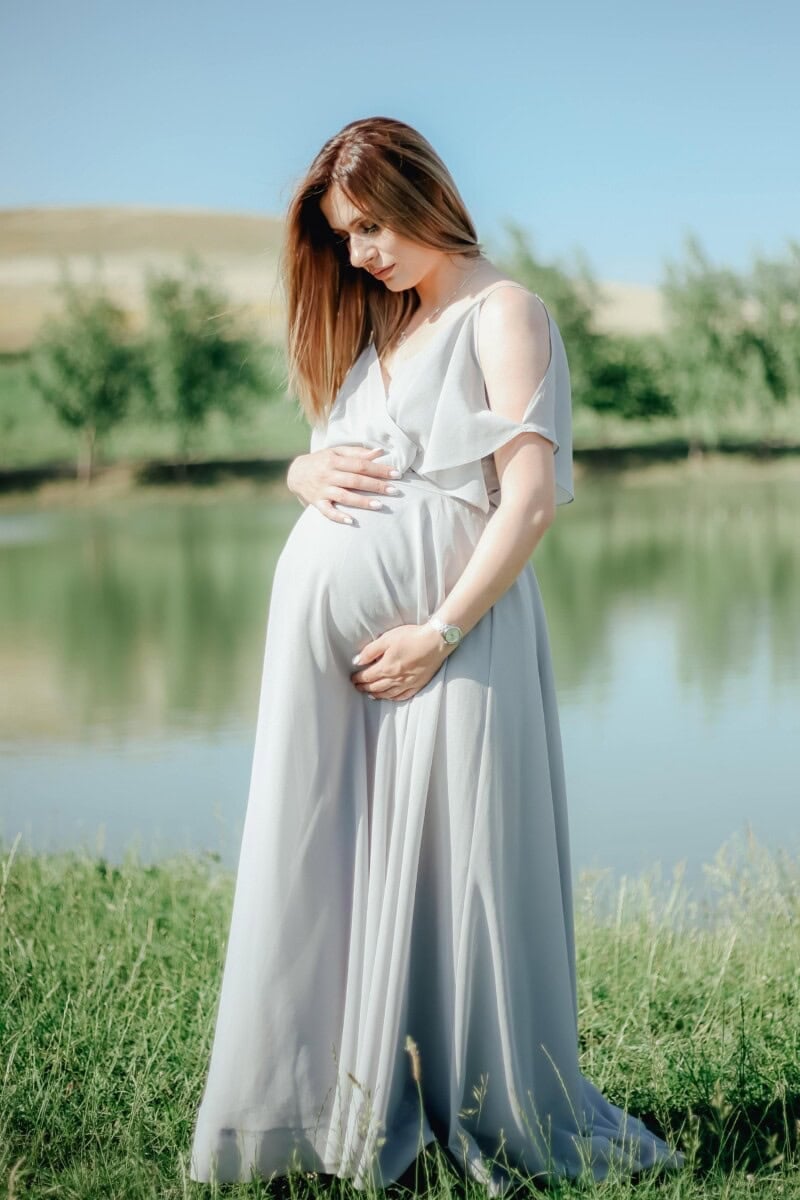 Light Grey Flowing Maxi Dress with Flutter, Office-Safe Version — Trendy Maternity Outfits