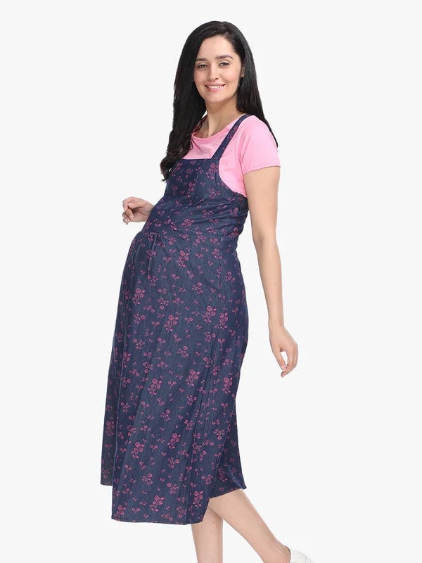 Floral Print Pinafore Dress Over Pink T-Shirt — Trendy Maternity Outfits