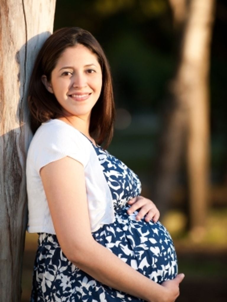 Floral Print Dress with White Cropped Cardigan — Trendy Maternity Outfits