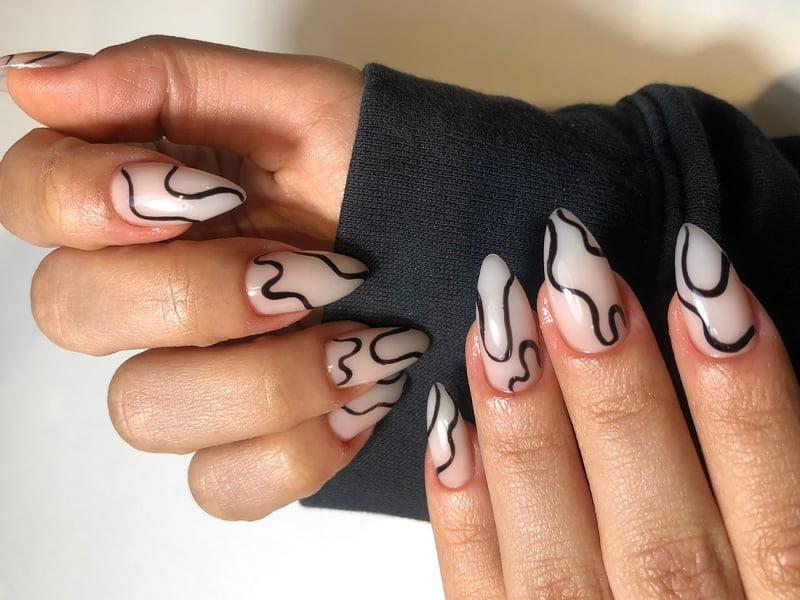 Sheer Nude Abstract Black Line Almond Nails — Trendy Medium Almond Nails