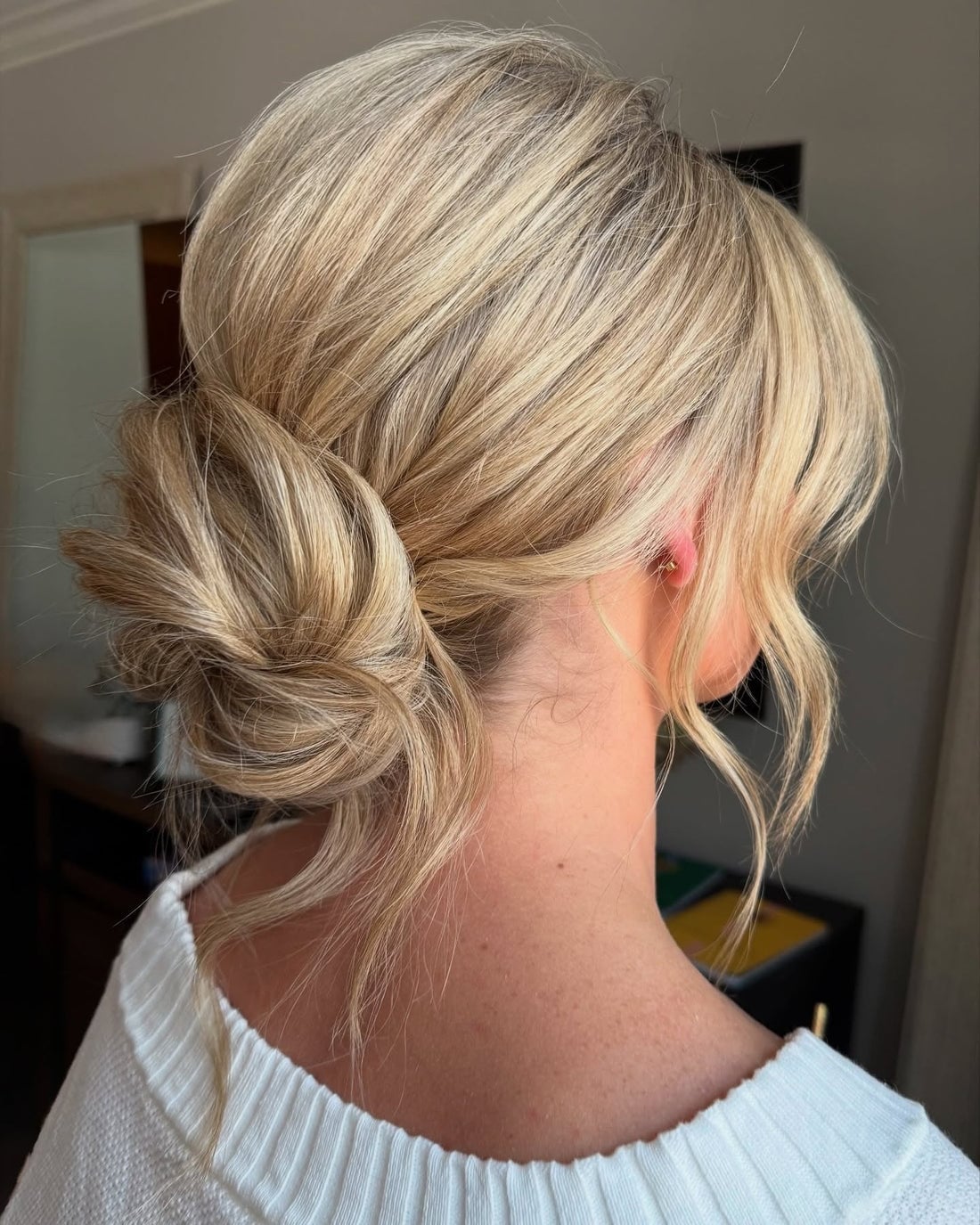 Ash Blonde Low Messy Bun With Soft Texture Ash Blonde Low Messy Bun With Soft Texture — Trendy Messy Bun Updo