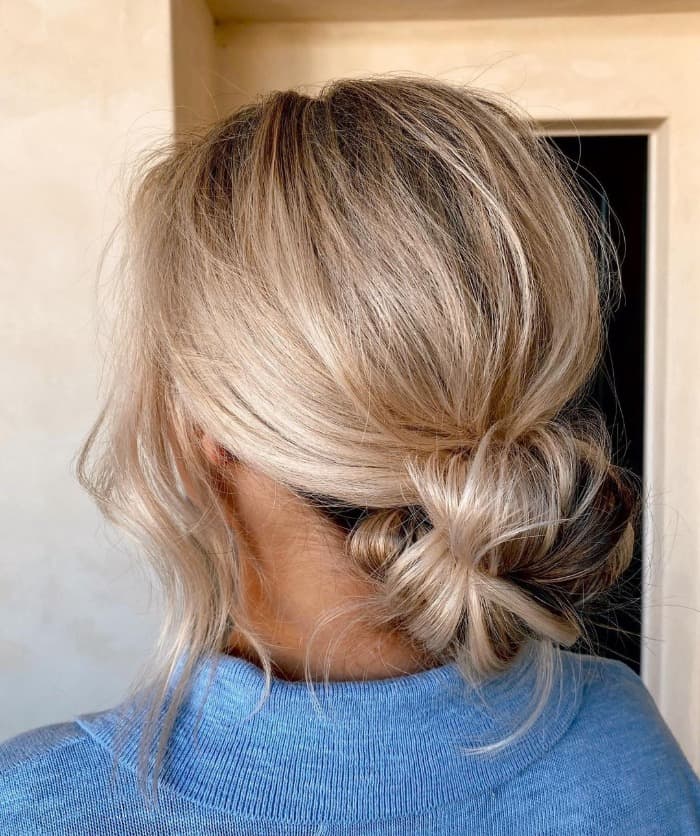 Ash Blonde Messy Low Bun With Textured Knot Ash Blonde Messy Low Bun With Textured Knot — Trendy Messy Bun Updo