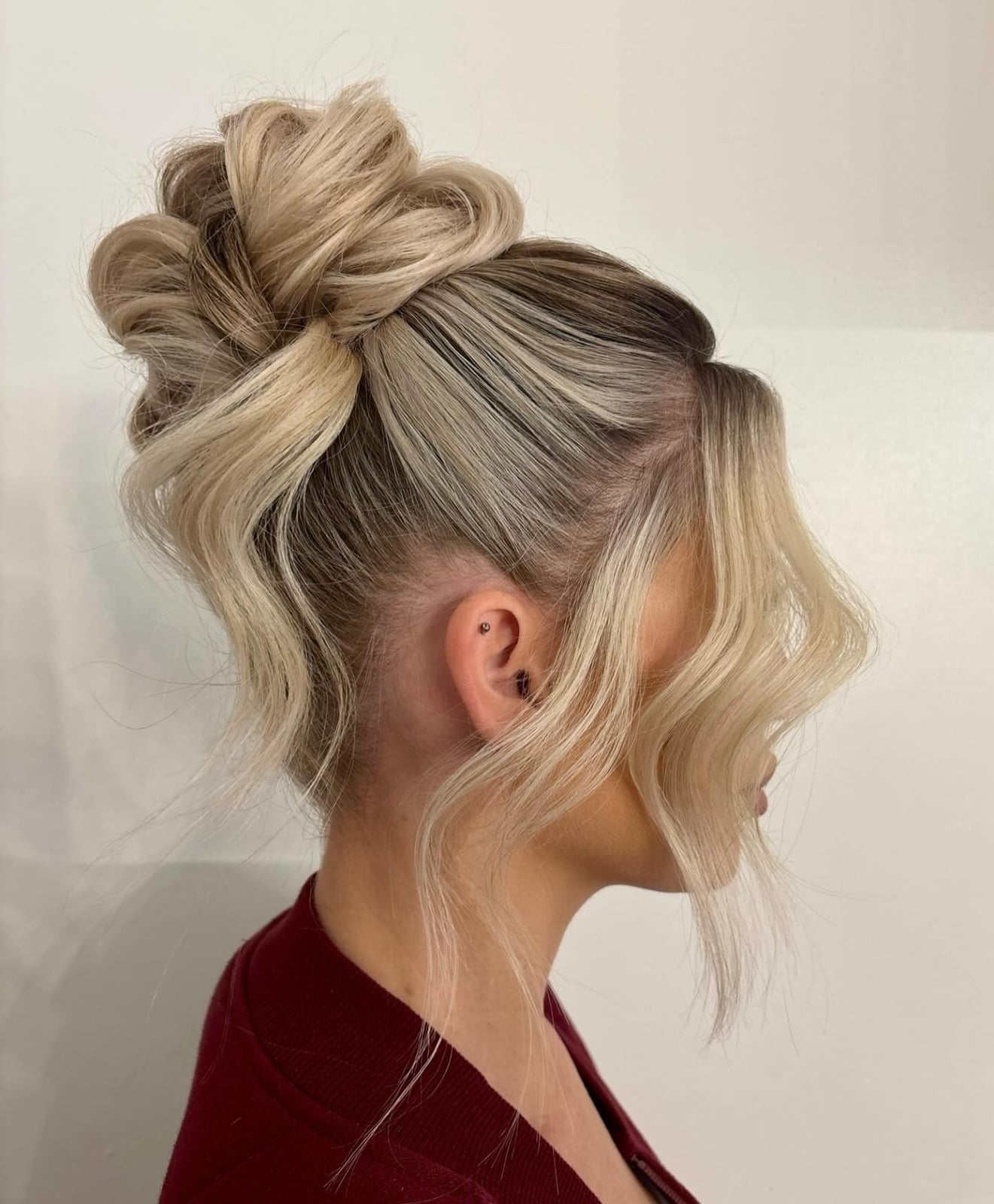 Platinum Blonde Messy Bun With Dark Roots Platinum Blonde Messy Bun With Dark Roots — Trendy Messy Bun Updo