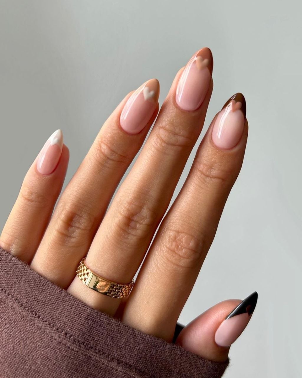 Medium Almond Nude French Tips with Brown Hearts Medium Almond Nude French Tips with Brown Hearts — Trendy Minimal Nails