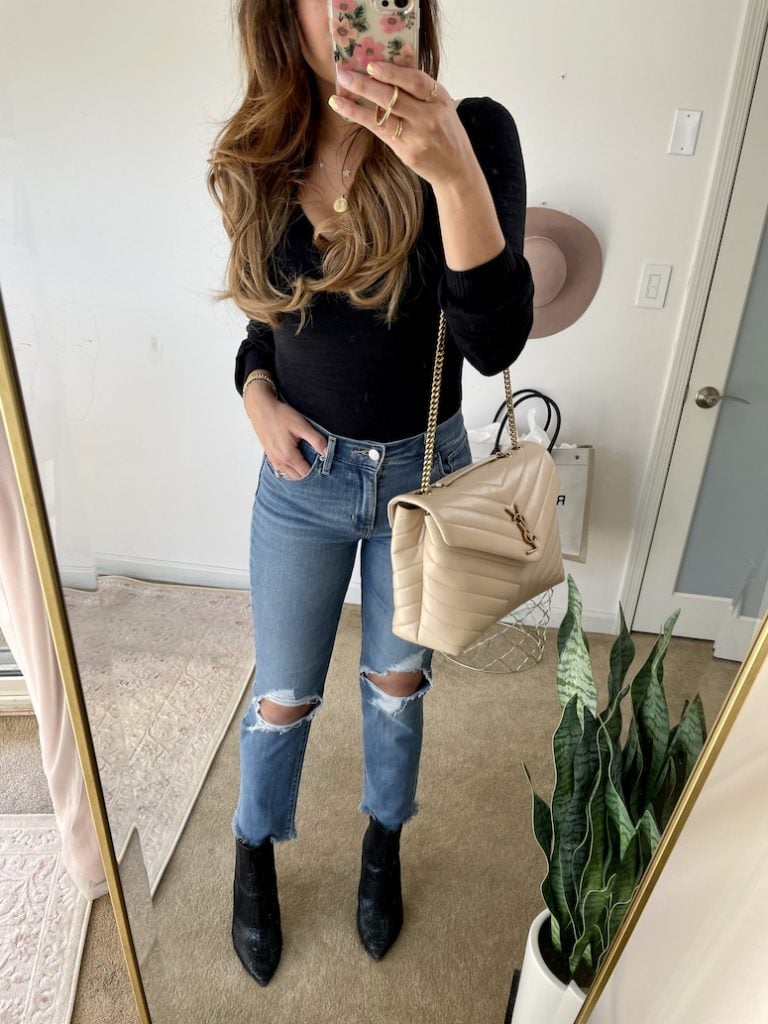 Ripped Blue Mom Jeans with Black Top and Black Ankle Boots — Trendy Mom Jeans Outfits