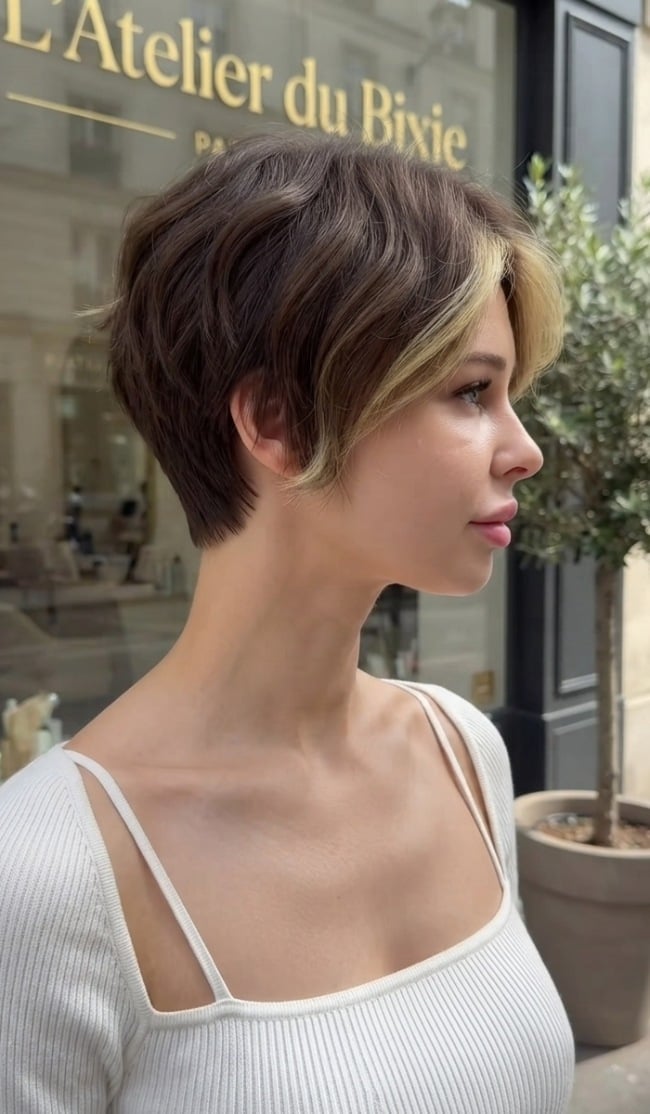 Textured Bixie With Side Swept Bangs And Blonde Money Piece — Trendy Money Piece Hair