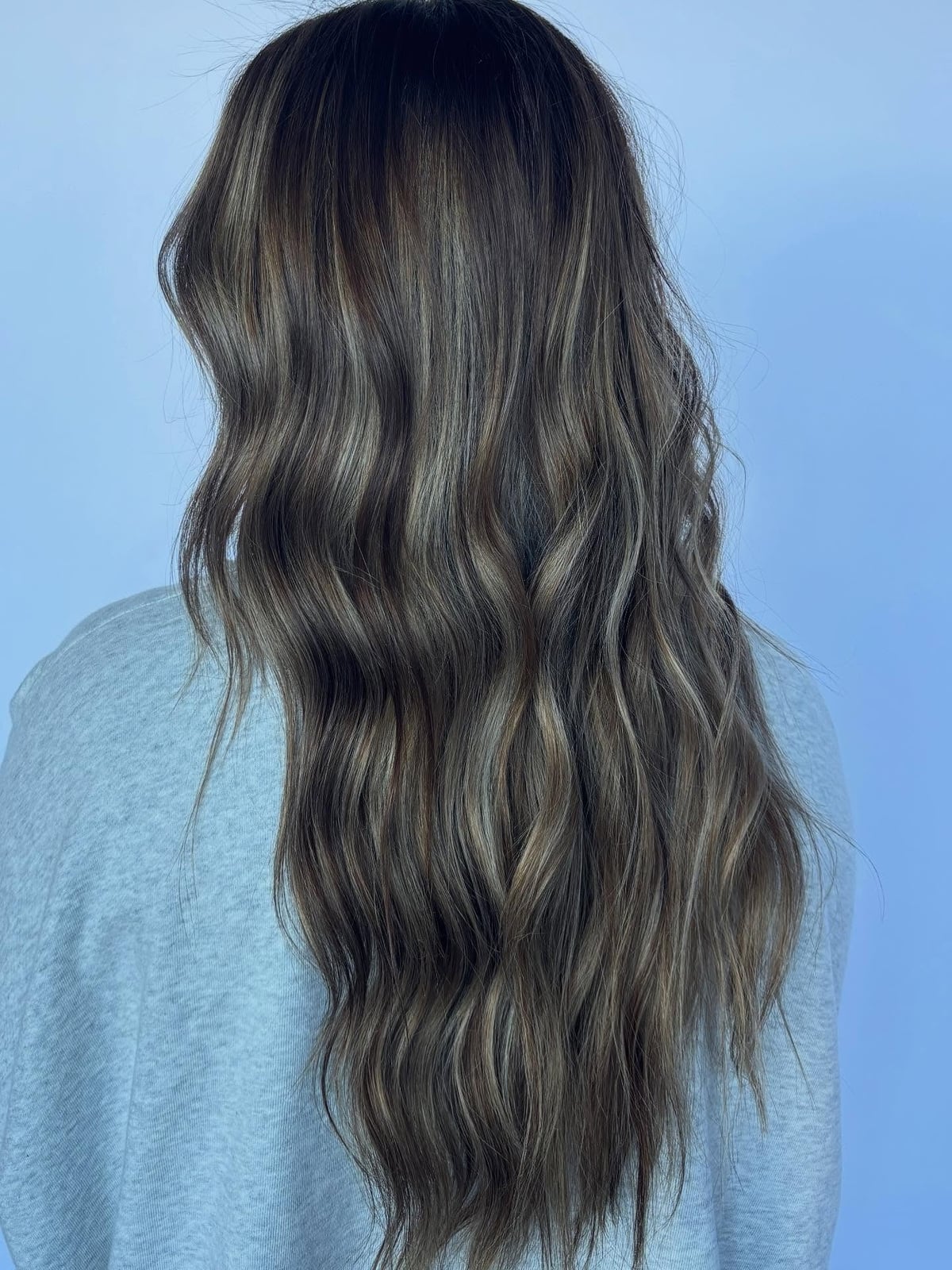 Mid-Back Wavy Mushroom Brown With Lighter Brown Highlights Mid-Back Wavy Mushroom Brown With Lighter Brown Highlights — Trendy Mushroom Brown Hair Color