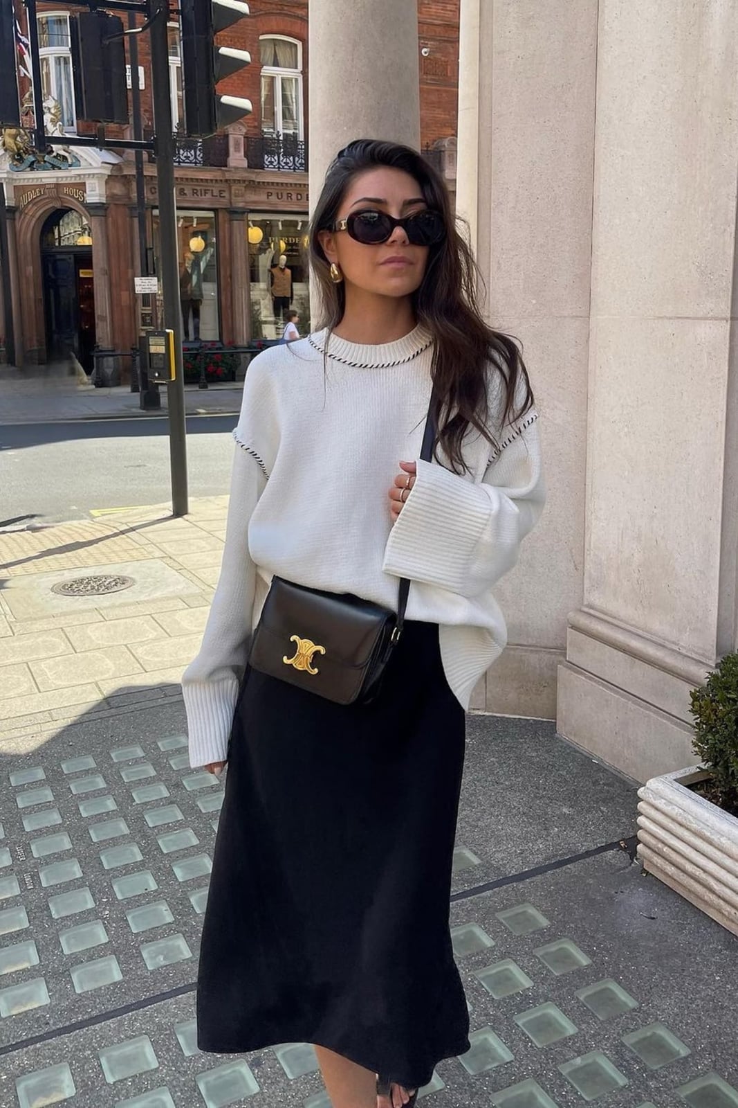 White Oversized Knit Sweater with Black Midi Skirt White Oversized Knit Sweater with Black Midi Skirt — Trendy Old Money Outfits