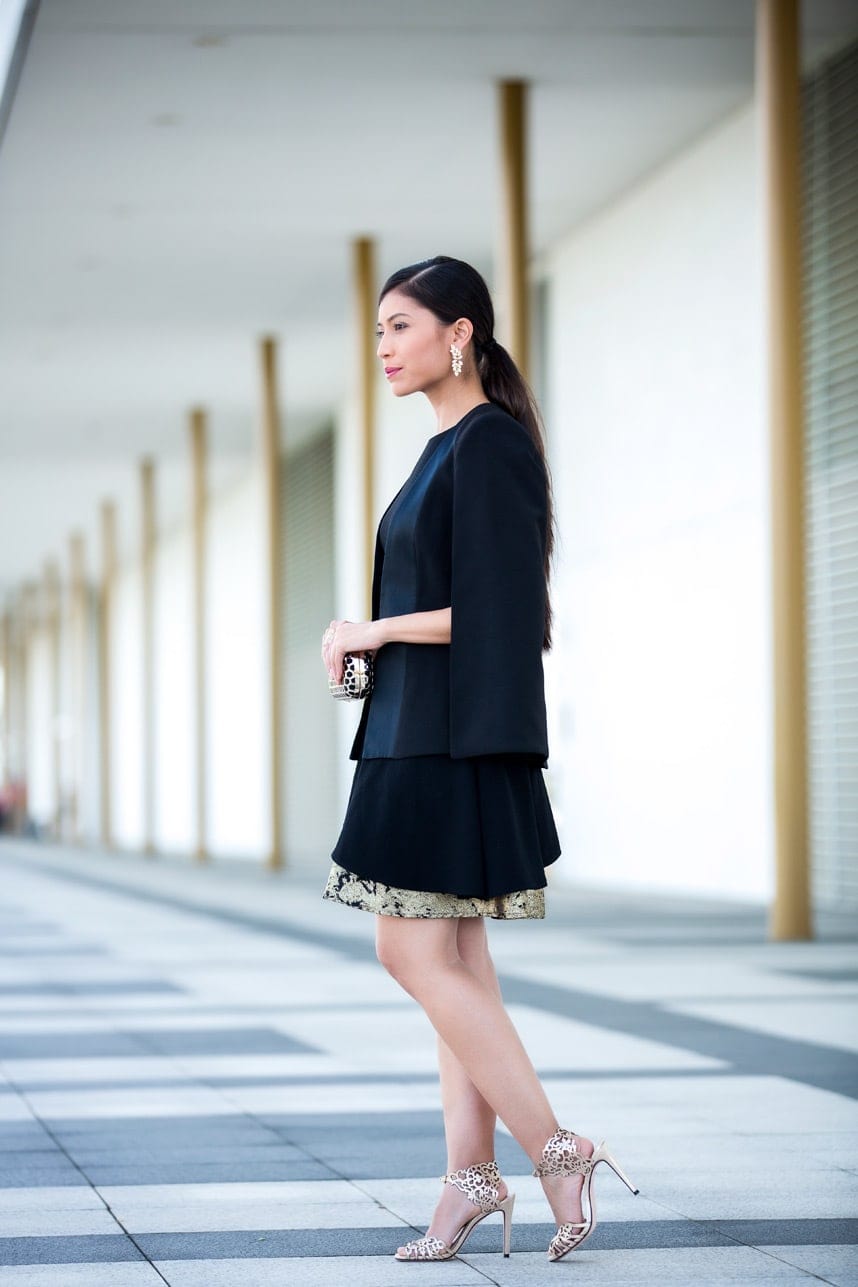 Black Capelet Jacket Over a Mini Dress with Gold Hem Black Capelet Jacket Over a Mini Dress with Gold Hem — Trendy Opera Outfits