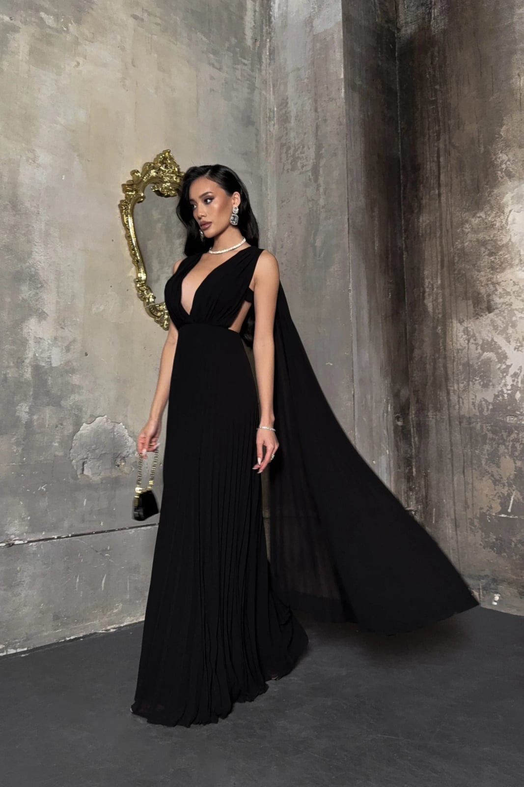 Black Gown with Flowing Cape and Pearl Accessories Black Gown with Flowing Cape and Pearl Accessories — Trendy Opera Outfits