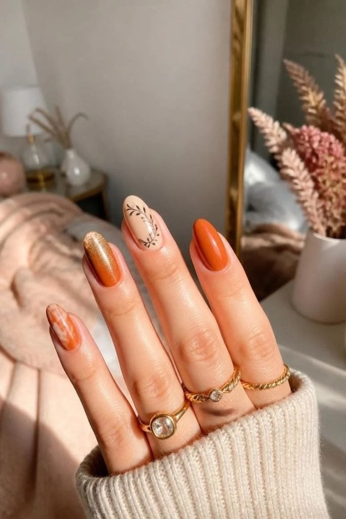 Short Oval Burnt Orange Shimmer Marble Leaf Short Oval Burnt Orange Shimmer Marble Leaf — Trendy Orange Nails