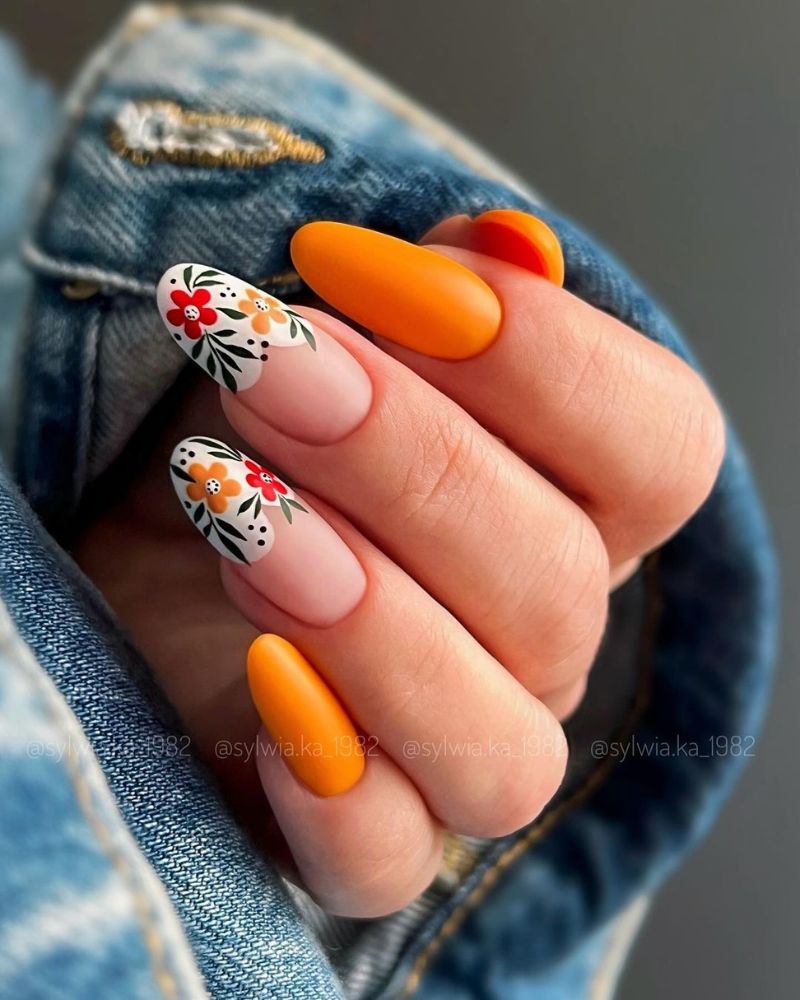 Long Almond Matte Orange Floral Art, Close-Up Take Long Almond Matte Orange Floral Art, Close-Up Take — Trendy Orange Nails