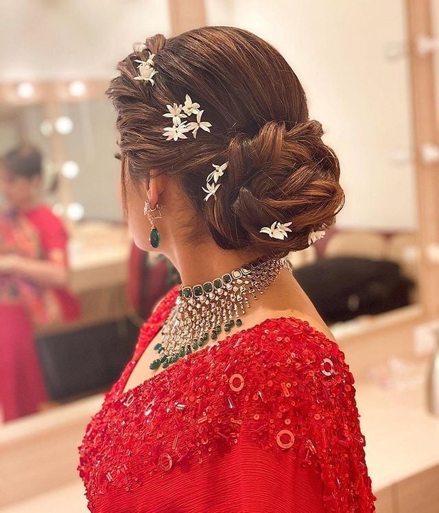 Intricate Braided Updo With Floral Accents — Trendy Party Hair
