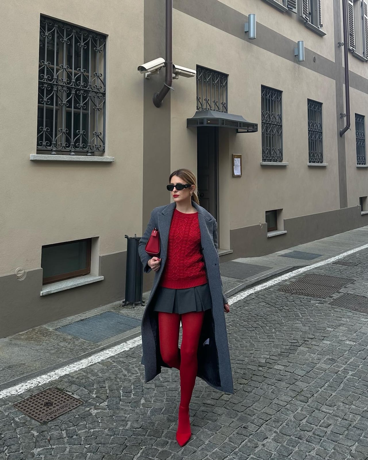 Grey Coat Over Red Sweater with Pleated Mini Skirt and Red Tights — Trendy Party Outfits