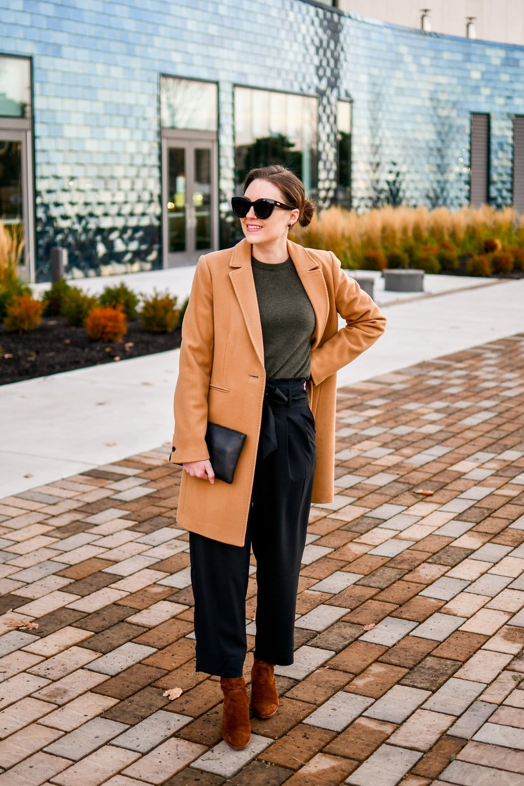 Camel Coat Over Green Top and Black High-Waisted Trousers — Trendy Party Outfits