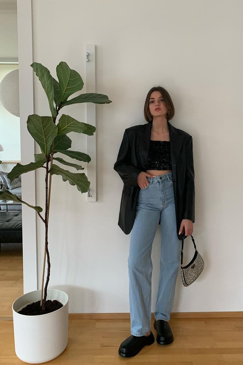 Black Leather Blazer Over Sequin Crop Top and Wide Leg Jeans — Trendy Party Outfits