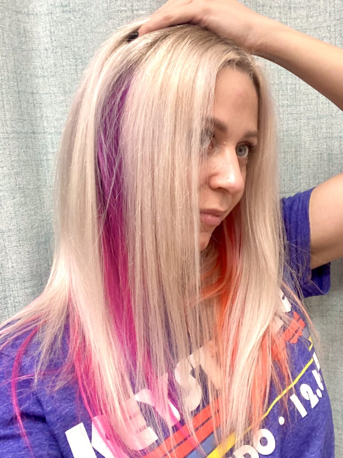 Blonde Lob With Pink Orange Peekaboo Strands Blonde Lob With Pink Orange Peekaboo Strands — Trendy Peekaboo Hair Color