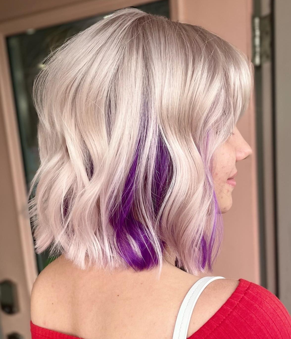 Platinum Blonde Bob With Purple Peekaboo Platinum Blonde Bob With Purple Peekaboo — Trendy Peekaboo Hair Color