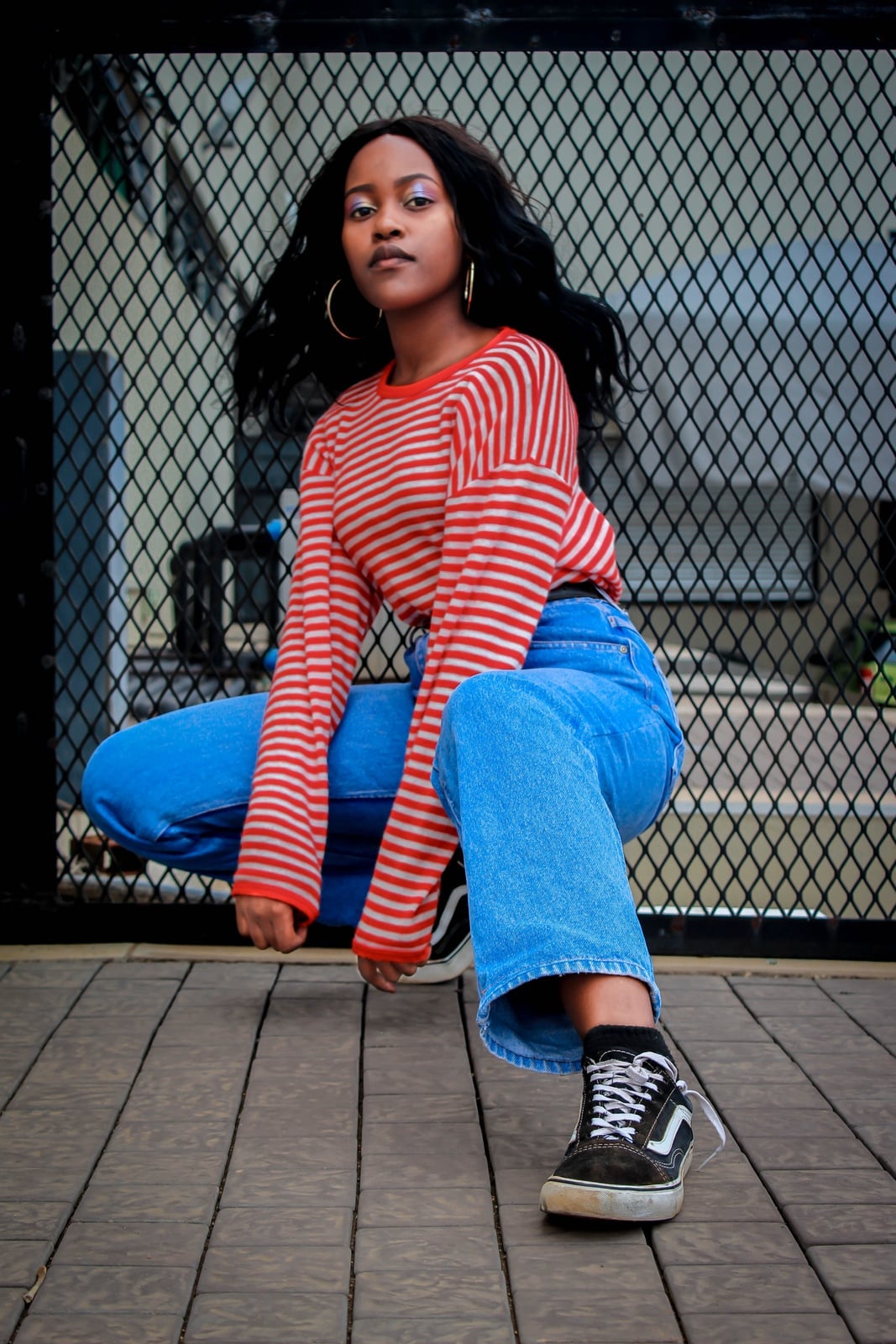 Classic Red and White Striped Tee with Blue Denim Jeans — Trendy Photoshoot Outfits