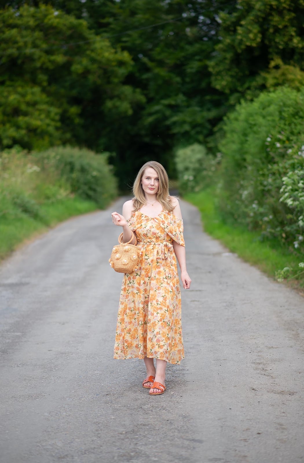 Vibrant Floral Print Midi Dress with Orange Sandals — Trendy Photoshoot Outfits