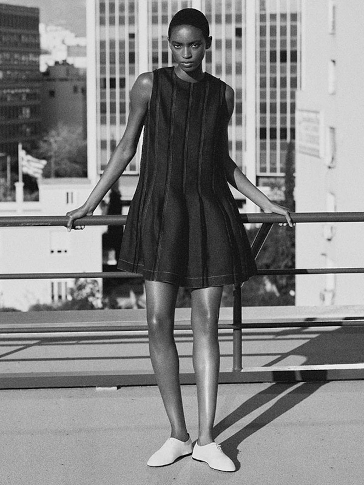 Minimalist Black A-Line Mini Dress with Pleats — Trendy Photoshoot Outfits