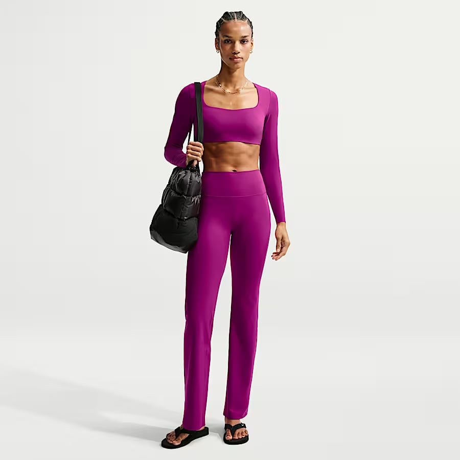 Purple Long-Sleeve Crop Top with Flared Pants and Puffer Bag — Trendy Pilates Outfits