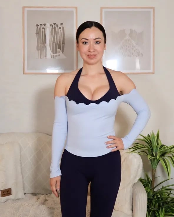 Light Blue Halter Top with Detached Sleeves and Navy Leggings — Trendy Pilates Outfits