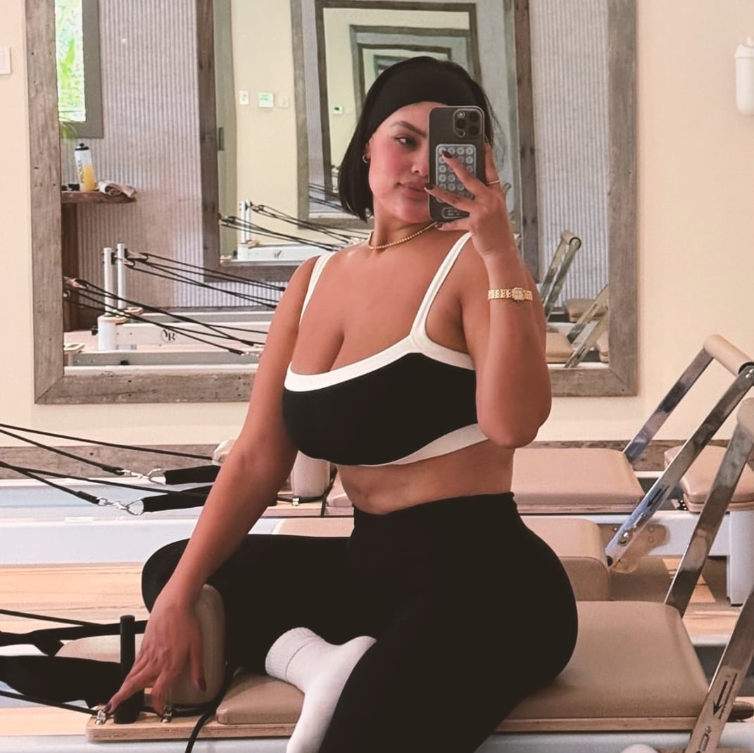 Black and White Sports Bra with Matching Leggings and Headband — Trendy Pilates Outfits