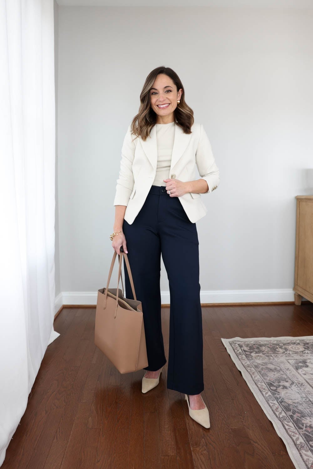 Ivory Cropped Blazer Over Beige Knit Top and Navy Trousers — Trendy Professional Outfits