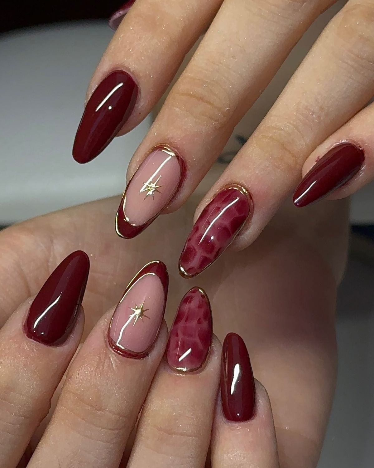 Deep Red Gold Trim Long Almond Nails Deep Red Gold Trim Long Almond Nails — Trendy Red Almond Nails