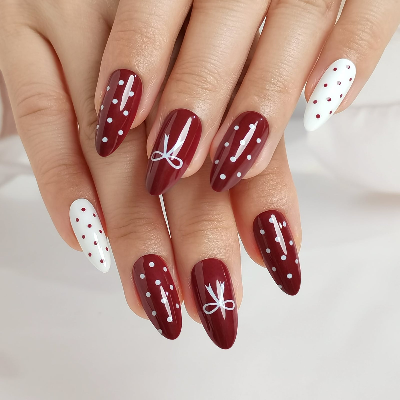 Dark Red White Polka Dot Bow Medium Almond Nails Dark Red White Polka Dot Bow Medium Almond Nails — Trendy Red Almond Nails