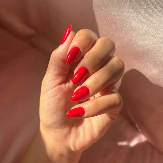 Vibrant Glossy Short Almond Nails Vibrant Glossy Short Almond Nails — Trendy Red Almond Nails