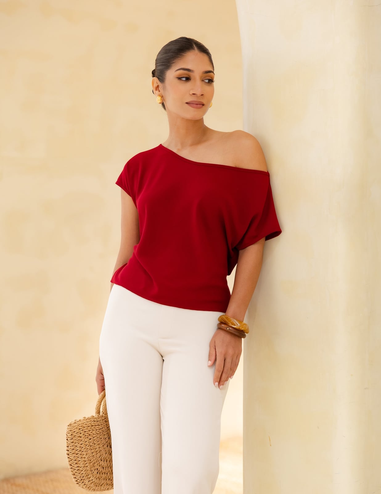 Red Off-Shoulder Knit Top with Cream Trousers and Large Gold Earrings Red Off-Shoulder Knit Top with Cream Trousers and Large Gold Earrings — Trendy Red Top Outfits