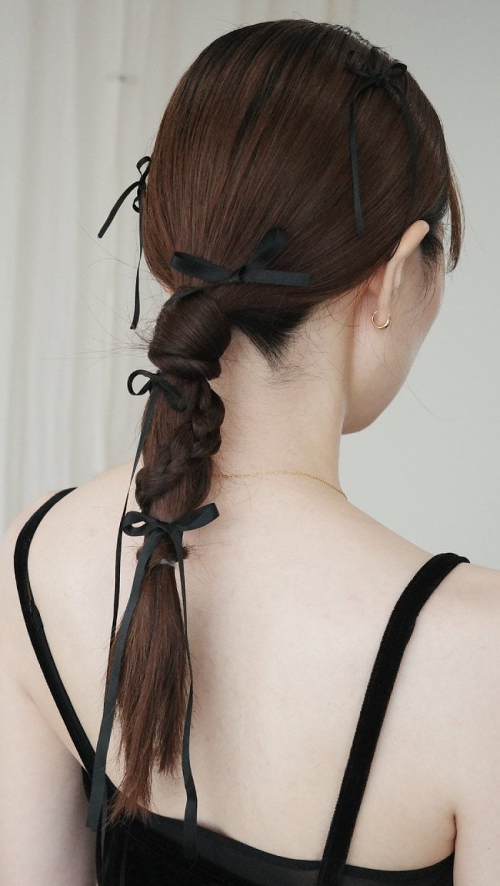 Single Dark Brown Braid With Multiple Ribbon Bows Single Dark Brown Braid With Multiple Ribbon Bows — Trendy Ribbon Braids